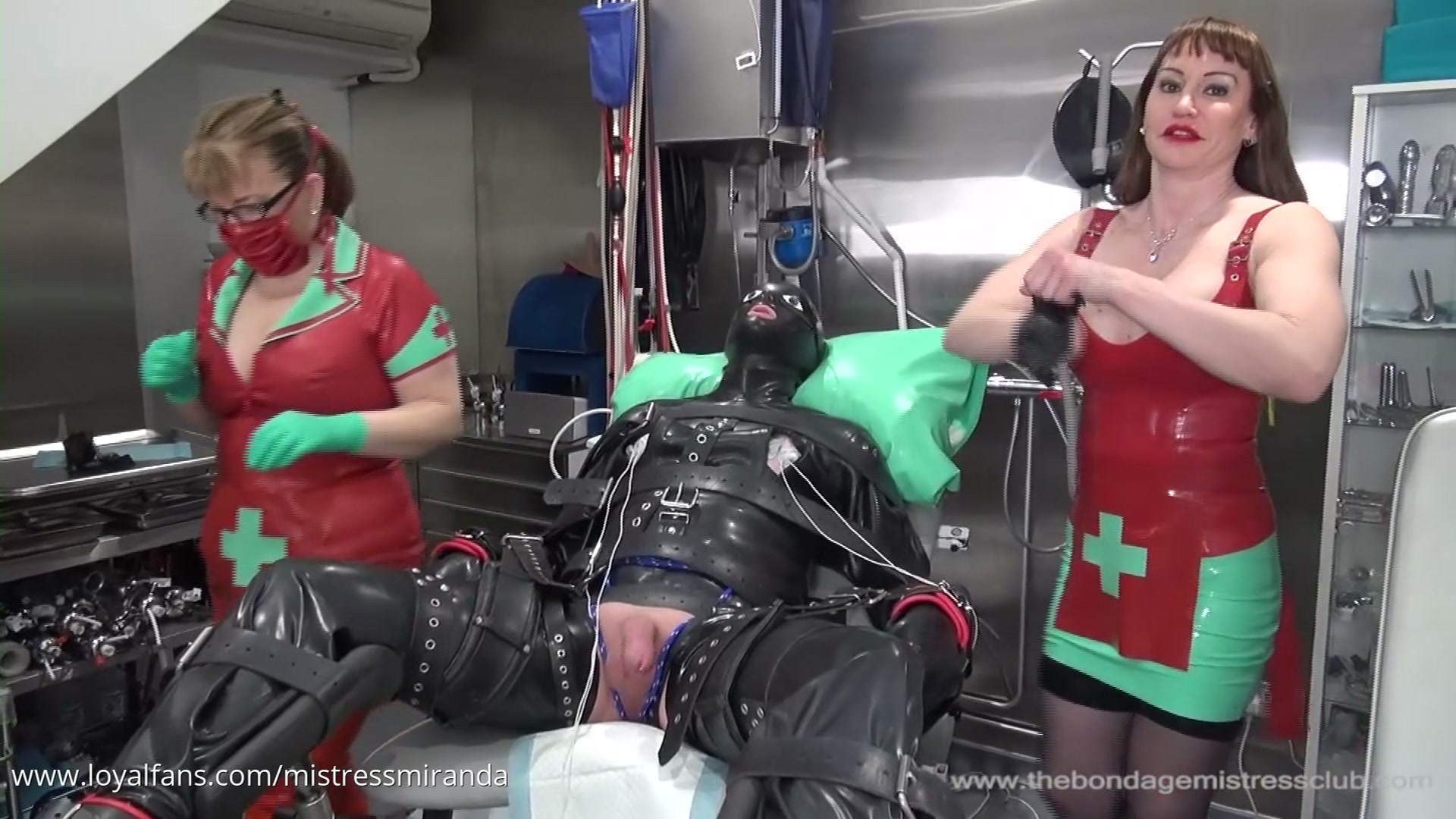 Miss Miranda and Lady Annisas conducting gyno chair humiliation with 4 hands CBT check - critical analysis by Mistress Katharina Amara at Amara Fetish Clinic Belgium